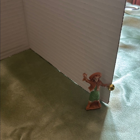 Charming Figurine with Green and Brown Attire - Picture 1 of 6